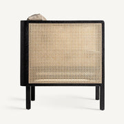 Fekete színre festett mangófából készült, rattan betétes kialakítású, bézs színű szövettel kárpitozott fotel.