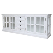 Fehér színű, 4 ajtós és 4 fiókos vitrines komódszekrény.