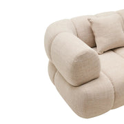 Krémszínű, 3 személyes formatervezett design kanapé.