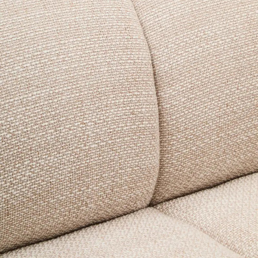 Krémszínű, 3 személyes formatervezett design kanapé.