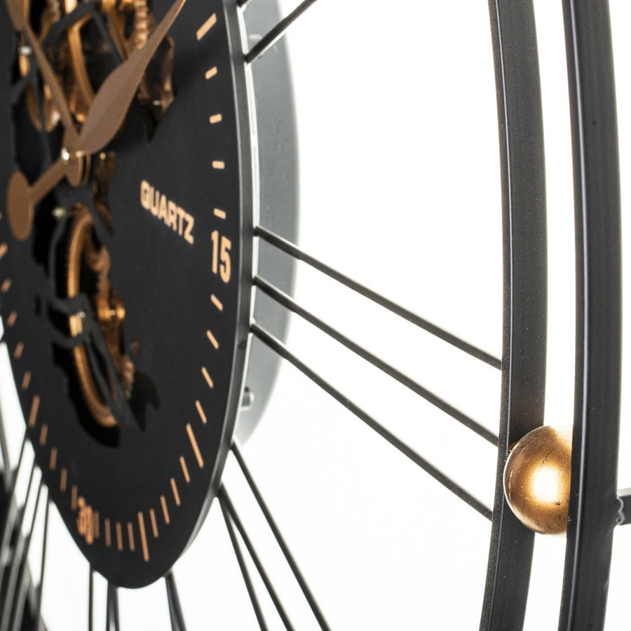 Fekete-arany színű óriás falióra.