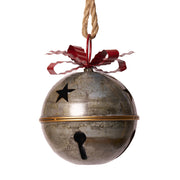 Piros színű fém masnival díszített karácsonyi kézműves bádogcsengő.