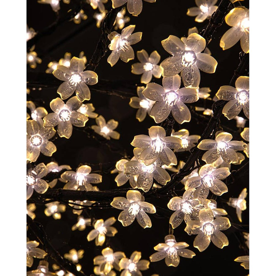 LED fényforrással kialakított, virágzó cseresznyefát idéző karácsonyi dekorációs fa.