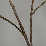 Virágzó mű cseresznyefa ág, halvány rózsaszín színű nyílt és bimbós virágokkal.