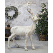 Antikolt felületű, krémszínű karácsonyi szarvas figura..