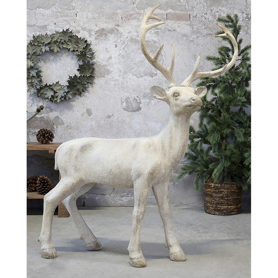 Antikolt felületű, krémszínű karácsonyi szarvas figura..