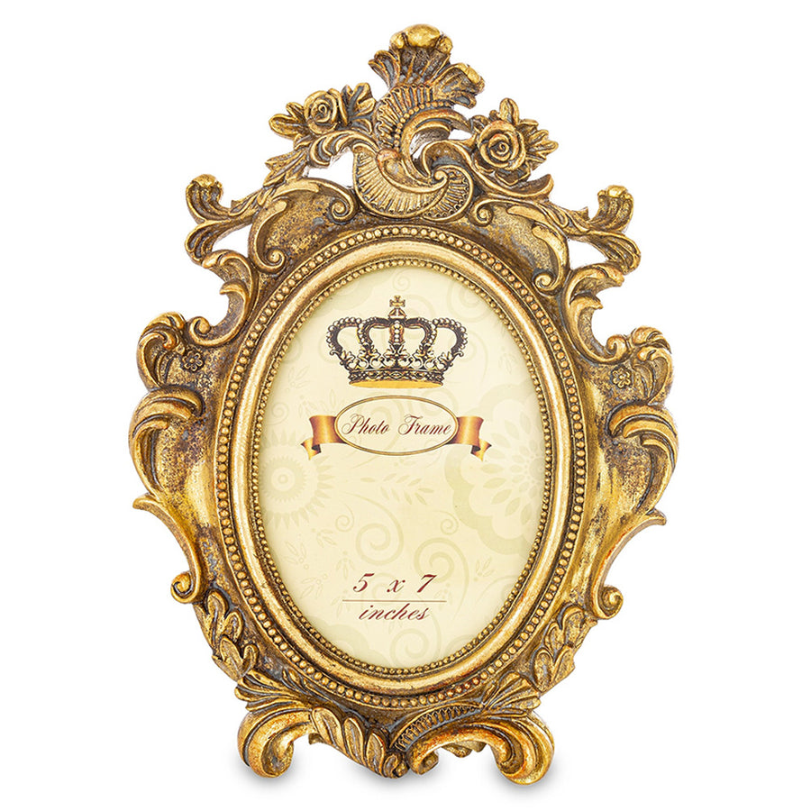 Barokkos levéldíszekkel díszített, antikot felületű, aranyszínű asztali fényképtartó képkeret.