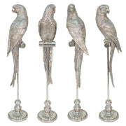 Pezsgőszínű, dekoratív papagáj figura.