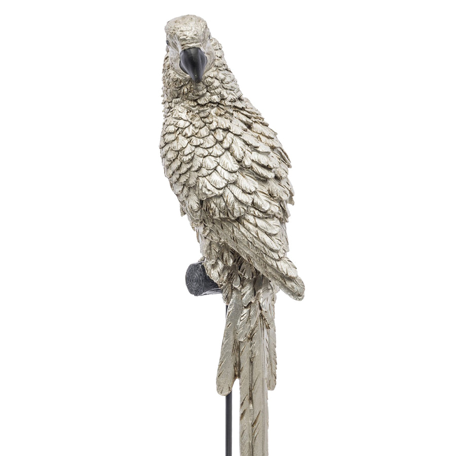 Ezüstszínű, dekoratív papagáj figura.