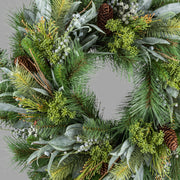Zöld színű, mű fenyő mix koszorú.