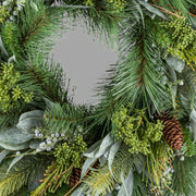 Zöld színű, mű fenyő mix koszorú.