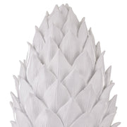 Fehér színű, dekoratív toboz dísz.