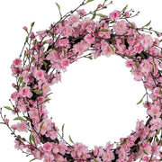 Rózsaszín, cseresznyevirág koszorú.