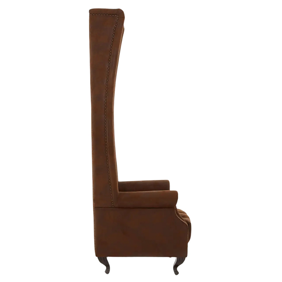 Rozsdabarna színű műbőrrel kárpitozott, trónszerű statement fotel.