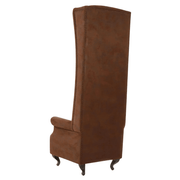 Rozsdabarna színű műbőrrel kárpitozott, trónszerű statement fotel.