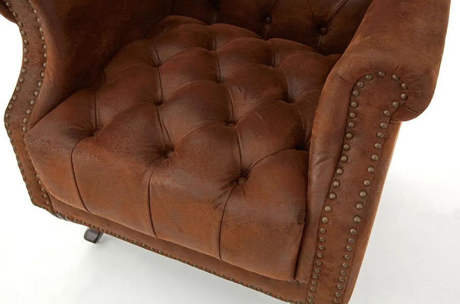 Rozsdabarna színű műbőrrel kárpitozott, trónszerű statement fotel.