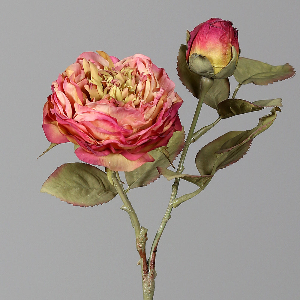 Fáradt pink színű mű rózsa élethű szirmokkal és vintage hatású levelekkel