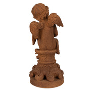 Rozsdabarna színű, antikolt felületű angyal figura.