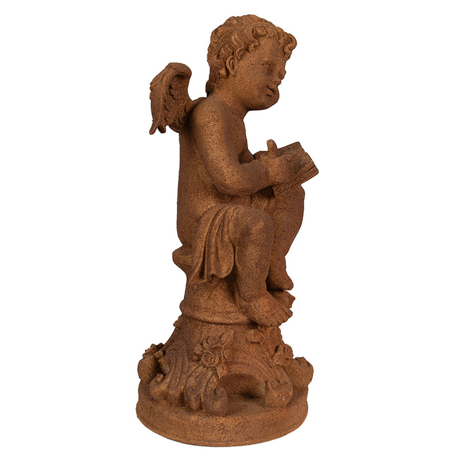 Rozsdabarna színű, antikolt felületű angyal figura.