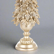 Aranyszínű, karácsonyi dekorációs fenyő kúp.