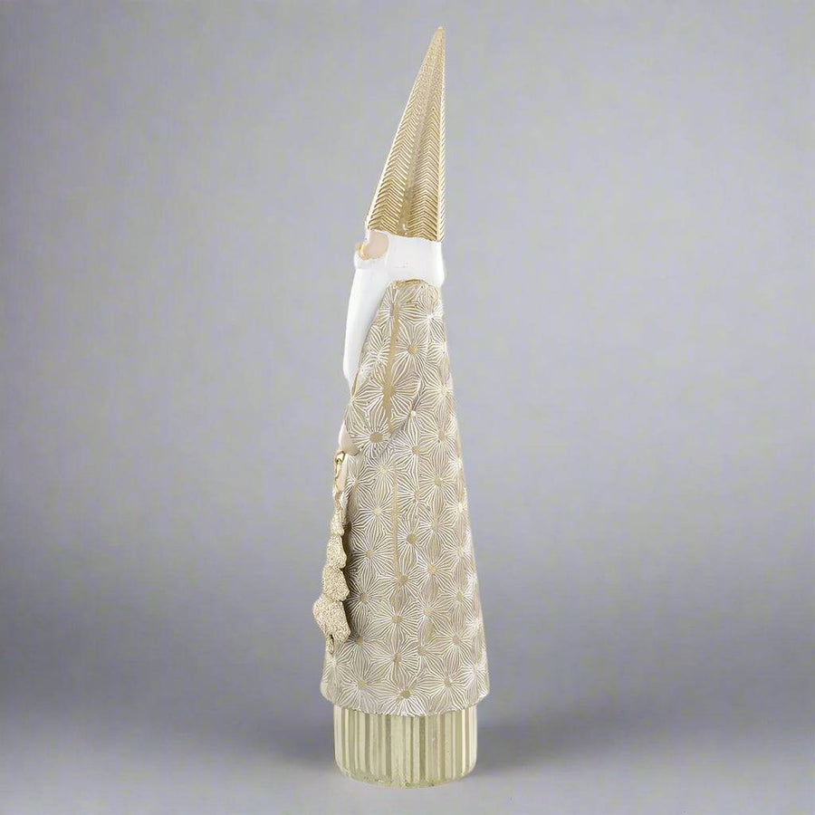 Modern karácsonyi dekoráció – 31 cm magas arany Mikulás figura ünnepi enteriőrbe.