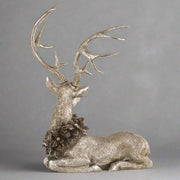 Pezsgőszínű karácsonyi szarvas figura.