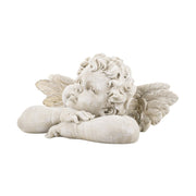 Kőhatású puttó figura.