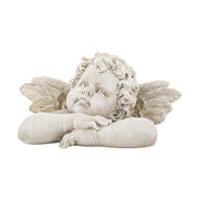 Kőhatású puttó figura.