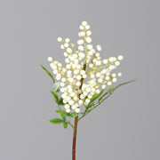 Krémszínű hóbogyó mű dekorációs ág, zöld levelekkel