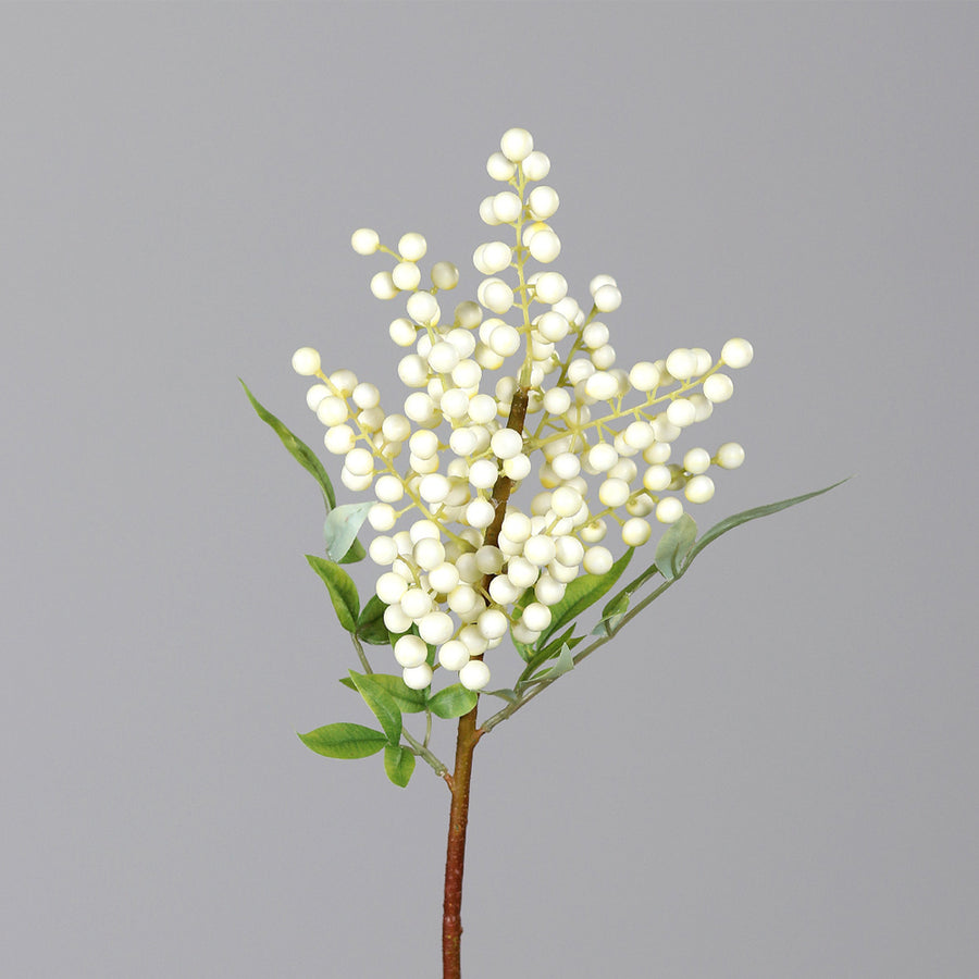 Krémszínű hóbogyó mű dekorációs ág, zöld levelekkel