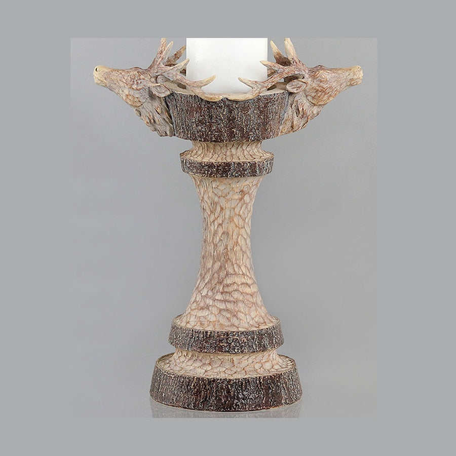 Natúr színű, szarvas figurás karácsonyi gyertyatartó.