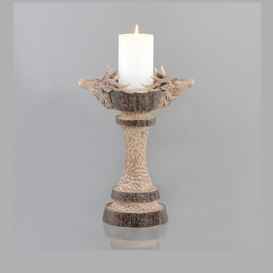 Natúr színű, szarvas figurás karácsonyi gyertyatartó.