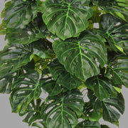 Zöld színű filodendron műnövény.