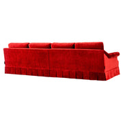 Vörös bársonyszövettel kárpitozott, 4 személyes kanapé.