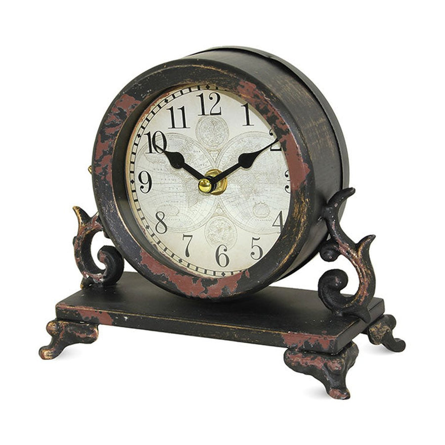 Antikolt felületű fém asztali óra.