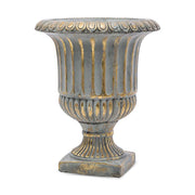 Rusztikus, antikolt felületű, kannelúrás díszítésű, arany-szürke színű cement kaspó.