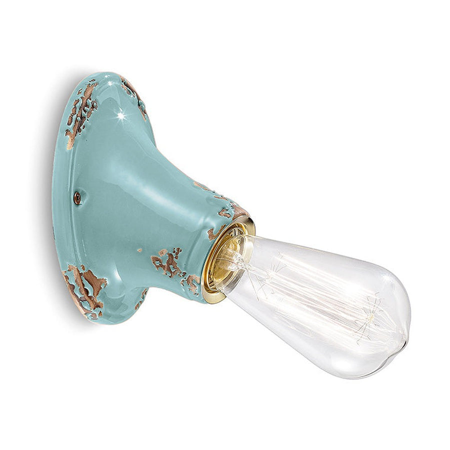 Antikolt felületű mázas kerámiából készült kézműves falilámpa.