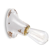 Antikolt felületű mázas kerámiából készült kézműves falilámpa.