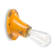 Antikolt felületű mázas kerámiából készült kézműves falilámpa.