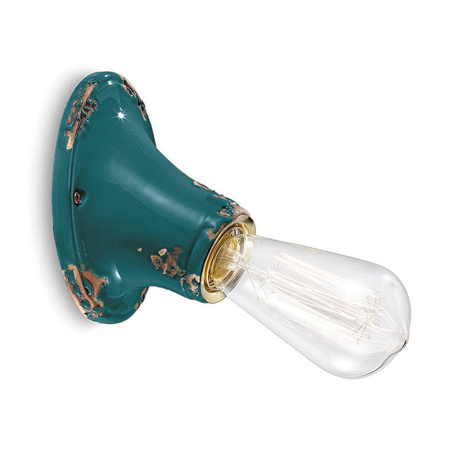 Antikolt felületű mázas kerámiából készült kézműves falilámpa.