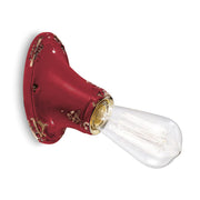 Antikolt felületű mázas kerámiából készült kézműves falilámpa.