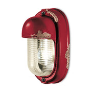 Antikolt felületű mázas kerámiából és bordázott üvegből készült kézműves falilámpa.