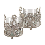 Antikolt felületű,, üvegbetétes fém mécsestartó.