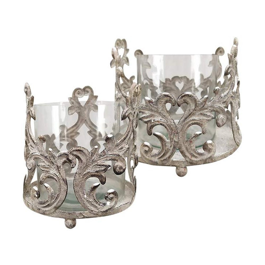 Antikolt felületű,, üvegbetétes fém mécsestartó.