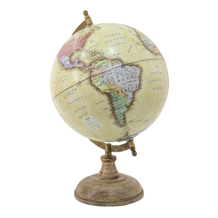 Antik sárga alapszínű, vintage stílusú dekor földgömb, mangófa talapzaton.