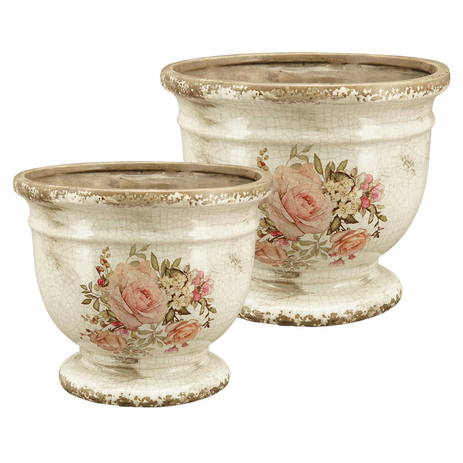 Két rózsamintás kerámia kaspó egymás mellett – talpas, vintage stílusú kaspók különböző méretben, beltéri vagy fedett kültéri használatra