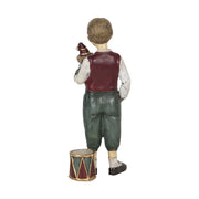 Karácsonyi kisfiú bohóccal és dobbal.