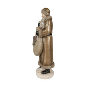 Óarany színű, karácsonyi Télapó figura.