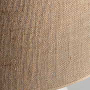 Fekete színű, égetett agyagból készült kézműves asztali lámpa.