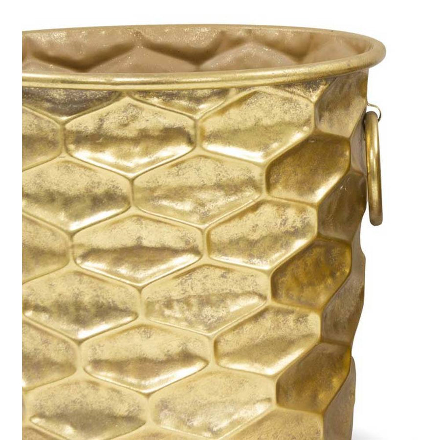 Modern stílusú, antik arany színű, 24,5 és 30 cm átmérőjű, dombormintás felületű, fém kaspó szett.